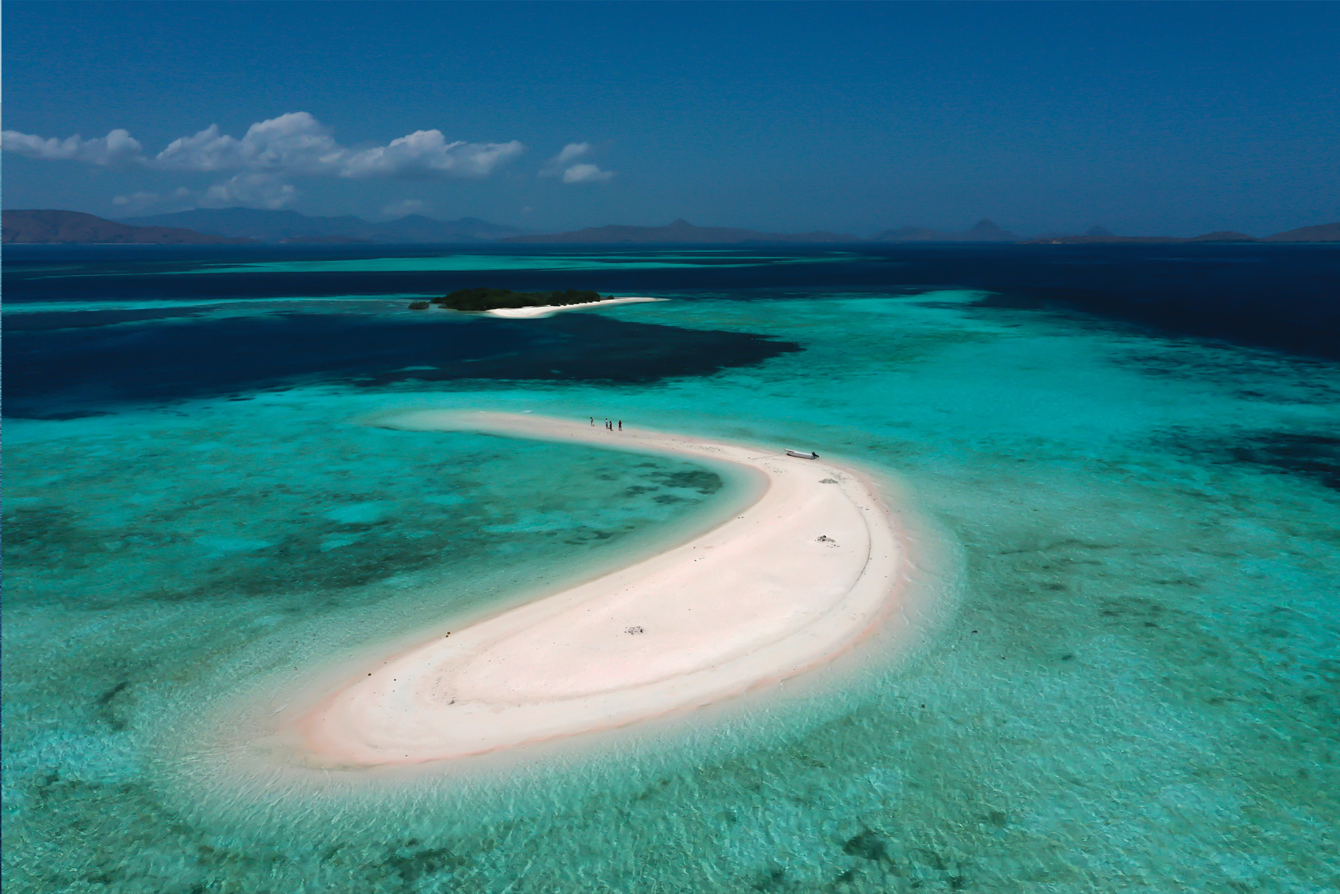 Explore a crescent-shaped island